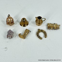 7 Loose Gold-Tone Charms Or Pendants