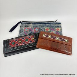 Hand Crafted Leather Wallets And A Vietnamese Cloth Zippered Pouch