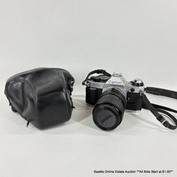 Canon AE-1 Single-Lens Reflex Vintage 35mm Camera With Sigma Lens And Protective Case