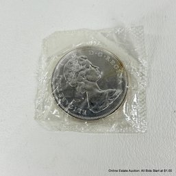 1955 80% Silver Ungraded And Circulated One Dollar Canadian Coin