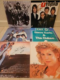 Autographed LPs And Photo Lot