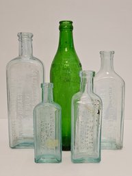5 Antique Embossed Glass Medicine Bottles