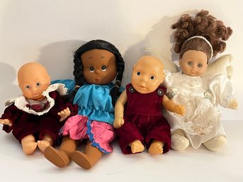 4 Plastic And Bead Baby Dolls