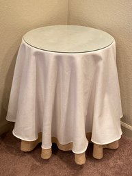 Wooden Side Table With Tablecloth And Glass Top