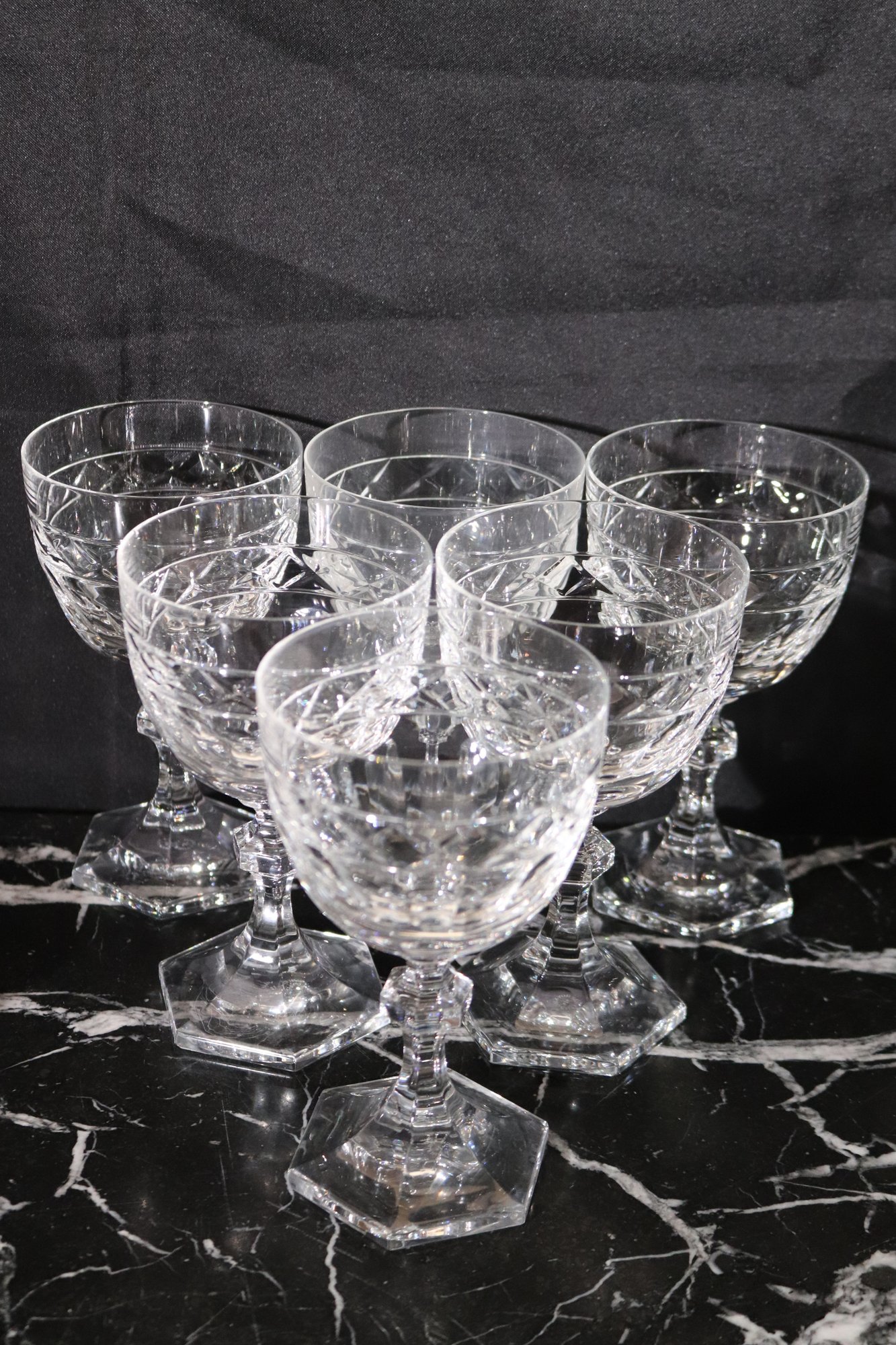 Includes 6 Water Glasses, 4 White Wine Glasses And 8 Champagne Glasses