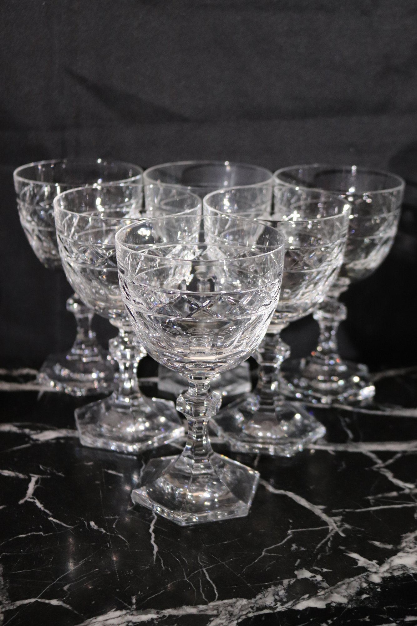 Includes 6 Water Glasses, 4 White Wine Glasses And 8 Champagne Glasses