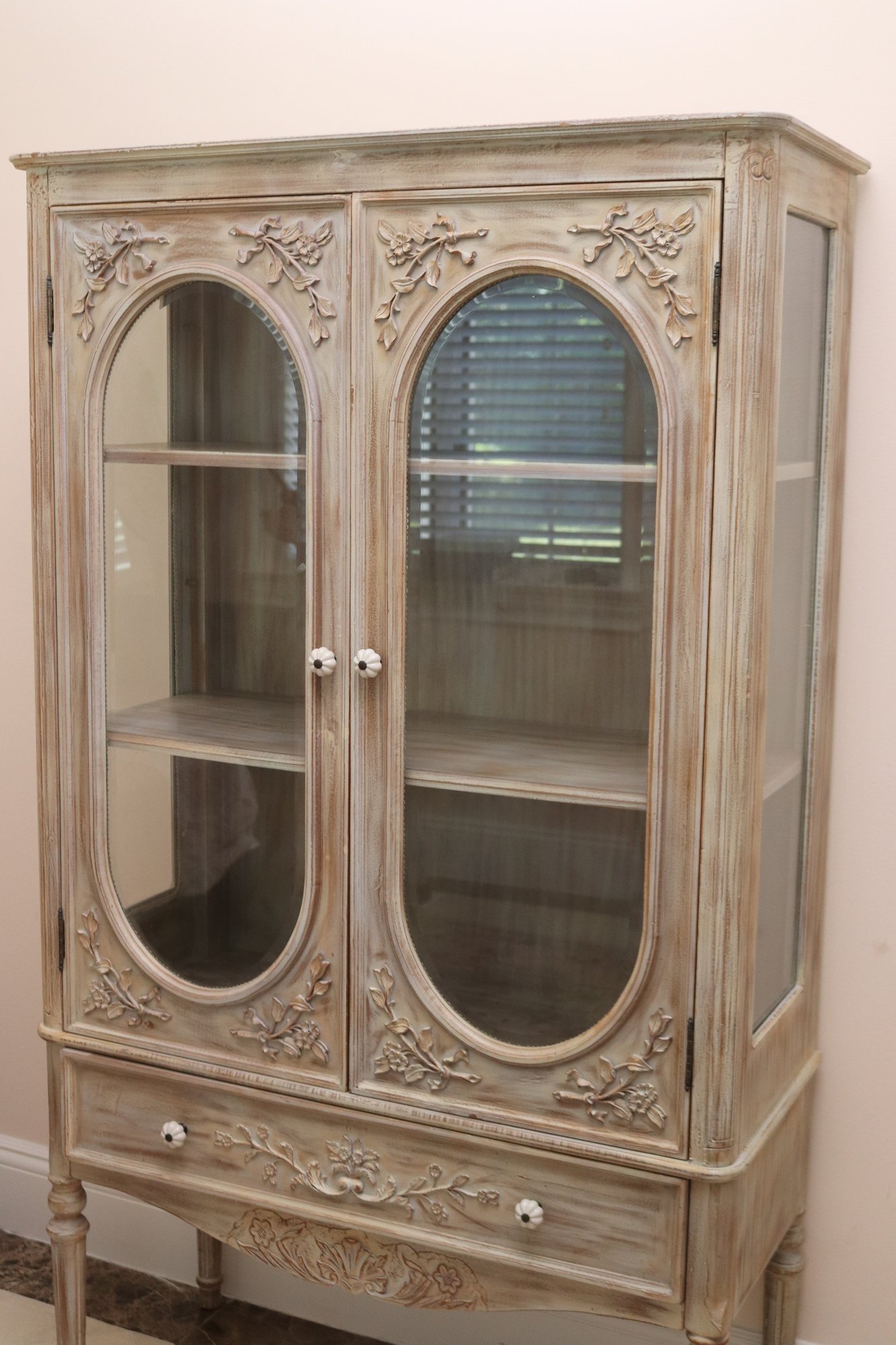 Lightwood Display Curio With Oval Beveled Glass And Two