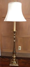 Traditional Floor Lamp With Brass Finished Base And Fabric Shade.
