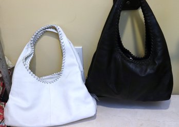 Two Ashrei Leather Pocketbooks With Multiple Compartments