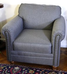 Cozy Club Chair With Nail Head Trim On Rolled Arms And Bun Feet, Upholstered In Textured Grayish/blue Fabric
