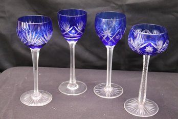 Assorted Cobalt Blue Bohemian Style Wine Glasses Ranging In Size