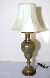 A Tall, Vintage, Indian Floral Engraved Brass Lamp With White Fabric Shade.