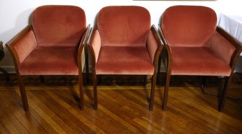Three Art Deco Style Armchairs With Wooden Frames And Two-tone Velvet Upholstery.