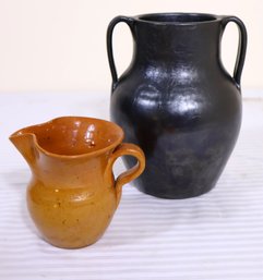 A Black Glazed Georgia Art Pottery Double Handled Pitcher And Small Clay Pitcher.