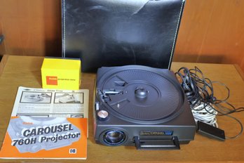 A Vintage Kodak Carousel Auto Focus Slide Projector And Carrying Case.
