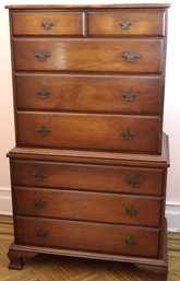 An 8-drawer Maple Wood Federal Style Dresser With Metal Handles.