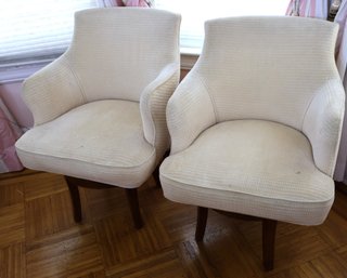 Pair Of Unique Modern Swivel Chairs With Wooden Bases.