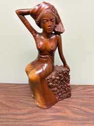 Carved Figurine Of Beautiful Asian Or Balinese Girl Sitting Atop Burl Wood
