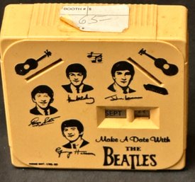 'Make A Date With The Beatles' Vintage Calendar Coin Bank