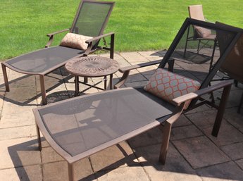 Pair Of Brown Jordans Chaise Lounges And Round Side Table.