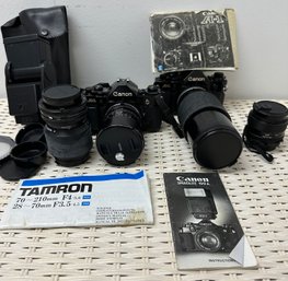 Two Canon A-1 SLR Cameras With 3 Lenses And Camera Case