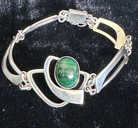 Sterling Silver 7 Inch Very Modern Design Open Bracelet With Green Semi Precious Stone.