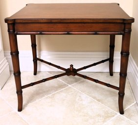 Carved Wood End Table With Bamboo Style Legs.