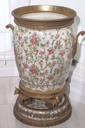 Wong Lee Antiqued Gilt Bronze Porcelain Footed Urn With Climbing Roses And Birds.