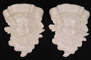 Pair Of Heavy Glazed Ceramic Wall Sconces Featuring A Cherub Face