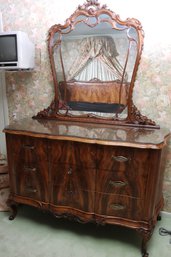 Antique Late Victorian Walnut Dresser With Elaborate Carved Mirror Frame.