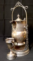 Vintage Ornate Silver Tone Tilting Tea Pot/Lemonade Pitcher On A Stand With A Cup