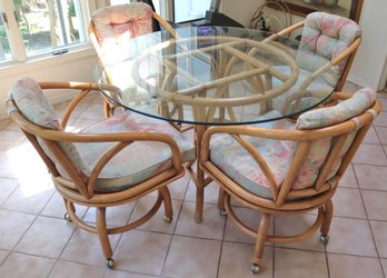 Vintage Rattan Table And Chairs With A Glass Top