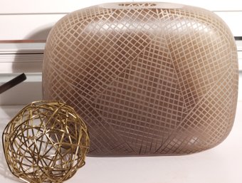 Home Decor Includes A Contemporary Vase And Brass Finished Sphere