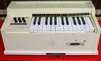 Magnus Electric Chord Organ Tested In Working Condition, Needs Cleaning - Approx. 19.5 W X 10 D X 9 Inches