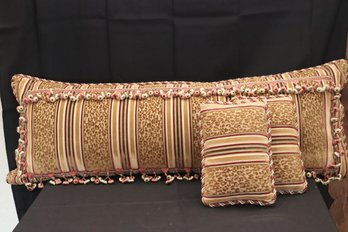 Collection Of Fine Decorative Pillows With Leopard Print Pattern And Tassel Accents