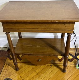 Early 1920s Wooden Side Table With Lower Drawer And Shelf.