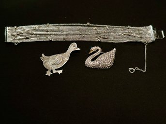 YAZZI, WEISS AND SWAROVSKI JEWELRY ITEMS