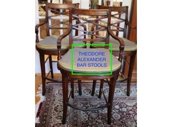 Three Theodore Alexander Flamed Mahogany X Backed Caned Regency Barstools With Footrest.