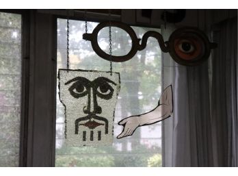 Hanging Wall Art Includes Large Glasses, Face, And Arm