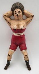 Vintage 'Naughty Nellie' Cast Iron Boot Jack Door Stop