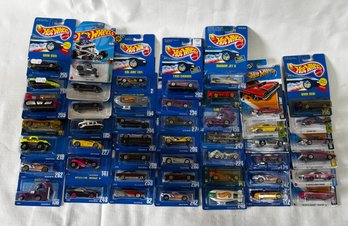 (47) Hot Wheels Mint In Card Sealed Lot Assorted Vehicles.