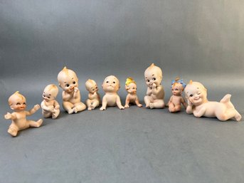 9 Reproduced Porcelain Kewpie Dolls.