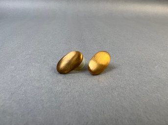 Gold Tone Oval Costume Earrings.