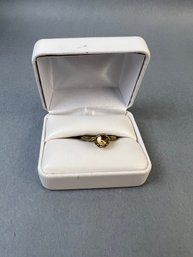 Size 7 Gold Tone And Amber Glass Ring.