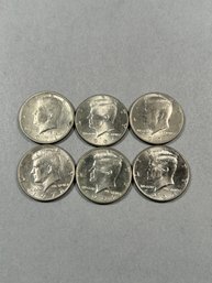 Six JFK Half Dollars