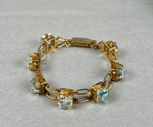 14k Yellow Gold & 7 Stone Blue Topaz Bracelet