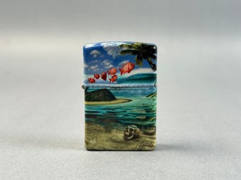 Zippo Windproof Lighter Designed By Rick Rietveld, Featuring A Tropical Beach Scene