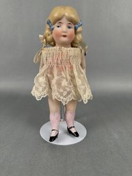 All Bisque Doll With Lace Dress