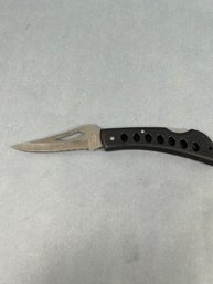 Frost Cutlery 9 Inch Folding Knife.