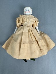 Porcelain 11 Inch Doll With Tan Color Dress